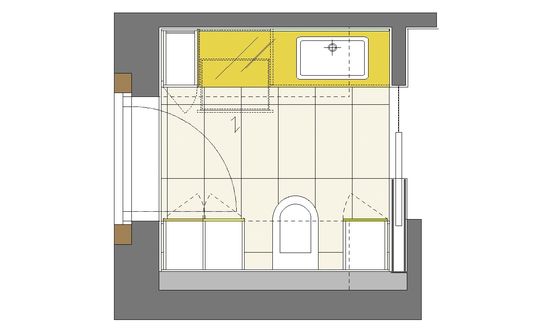 Das Gäste-WC ist in einem kleinen Raum mit Dachschräge untergebracht. Der Boden ist mit Platten aus Sandstein belegt. Der Raum strahlt heitere Atmosphäre aus.