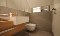 Innenarchitekt und Interior Designer Andreas Ptatscheck bietet in seinem Planungsbüro für Innenarchitektur Planung für Badezimmer. Das Beispiel zeigt das Handwaschbecken eines Gäste-WCs.
