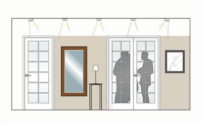 Farbflächen an den Wänden grenzen einzelne Raumbereiche ab und bilden Raumzonen, sie sind bis zur Oberkante der Türzargen angelegt und betonen so die horizontale Ausrichtung der Diele.