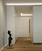 Das Planungsbüro von Innenarchitekt Andreas Ptatscheck, München, entwickelt exklusive Innenarchitektur und Interior Design für die Diele mit Garderobenschrank und Schuhschrank.