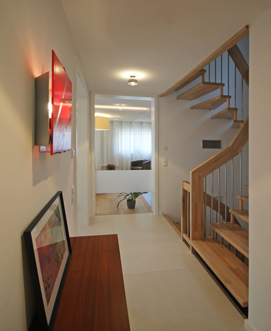 Das Planungsbüro eswerderaum von Andreas Ptatscheck, München, entwickelt Dielen, Hauseingänge, Entrées als Teil exklusiver Innenarchitektur.