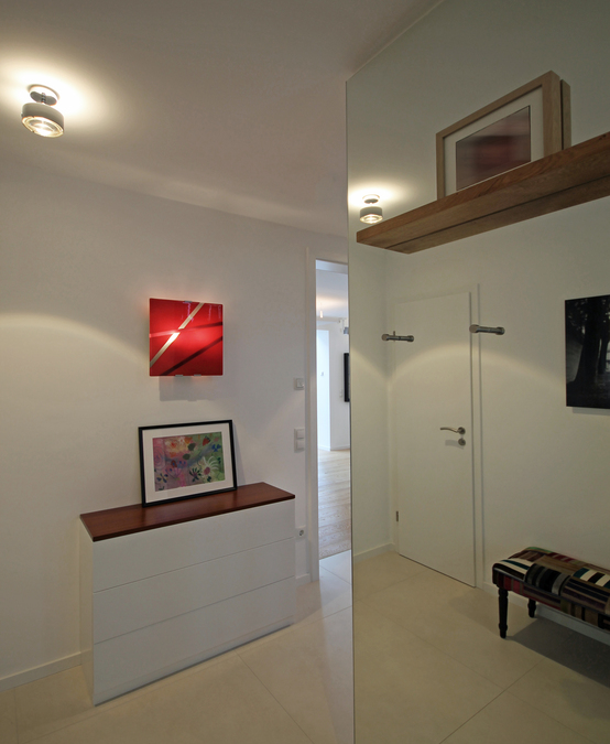 Das Büro für Innenarchitektur und Interior Design eswerderaum von Andreas Ptatscheck, Innenarchitekt in München, entwirft hochwertige Eingangsbereiche.