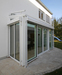 Innenarchitekt Andreas Ptatscheck, München, baute das Einfamilienhaus um und fügte einen Wintergarten an.