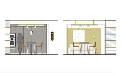 Die geschlossene Küchenzeile auf der einen, die farbig gestrichene Wand des Wohnbereichs auf der anderen Raumseite bilden die Raumabschlüsse, dazwischen ist der Speisebereich angeordnet.