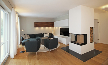 Innenarchitekt Andreas Ptatscheck, München entwickelt als Interior Designer kreative Raumideen für alle Bereiche der Innenarchitektur und des Interior Design, hier für ein Wohnzimmer mit Kamin.